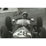 Stirling Moss Small 11cm x 7cm black and white magazine photograph signed and dedicated by legendary