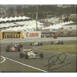 Nigel Mansell 18cm x 20cm colour magazine photograph signed by former Formula One World Champion