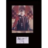 Merlin. Signature of Anthony Head with a picture in character as “Uther Pendragon.” Professionally