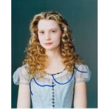 Mia Wasikowski 8x10 colour photo of Mia as Alice, signed by her in blue ink. Good Condition