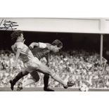 LIVERPOOL 8x12 inch photo hand signed by former Liverpool defender Mark Lawrenson. Good Condition