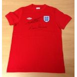 GEOFF HURST MARTIN PETERS Dual signed England shirt ideal for framing photo. Good condition