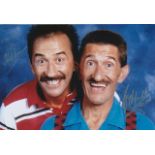 CHUCKLE BROTHERS 8x10 inch photo signed by the 'Chuckle Brothers' Barry and Paul Elliott. Good