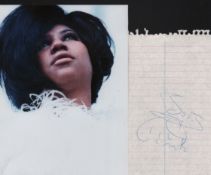 Aretha Franklin signed piece of lined paper with a b/w unsigned photograph. Good condition