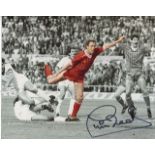 LIVERPOOL 8x10 inch photo hand signed by former Liverpool full back Phil Neal, pictured scoring