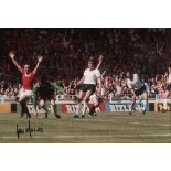 MANCHESTER UNITED 8x12 inch photo hand signed by former Manchester United striker Lou Macari,
