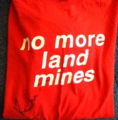Paul McCartney signed Red T-Shirt with No More Land Mines logo to front. Vendor bought the Paul