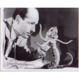 Ray Harryhausen. 10”x8” picture of the legendary animator posing one of his models. Excellent.