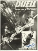 Haupt Wilhelm Johnen signed unusual 8 x 8 b/w WW2 plane in flight with inset photo of the pilot.