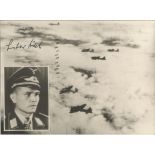 Obst Gustov Rodel KC OL signed unusual 8 x 8 b/w WW2 plane in flight with inset photo of the pilot.