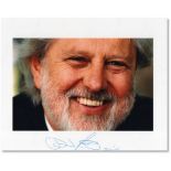 Photo of Chariots of Fire and The Killing Fields producer, David Puttnam, signed by Puttnam in the