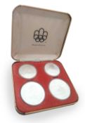 1976 Silver Coins Black Coin presentation case containing four Silver coins comm. 1976 Olympic Coins