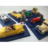 Tintin Model Cars Twelve cars mounted on blue bases with printed description plus over 20 tintin
