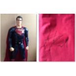 Superman model signed on cape by Henry Cavill (Superman in “Man of Steel” and upcoming “Batman vs
