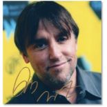 Full colour portrait of Boyhood director Richard Linklater, signed by Linklater in gold pen,