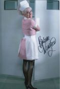 Carry On Comedy: 8x12 inch photo signed by actress Barbara Windsor