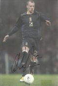 Alan Hutton in Scotland strip signed colour 12x8 photo. Good condition