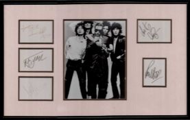 Rolling Stones signed by All four plus Bill Wyman framed and mounted presentation. Wooden frame with