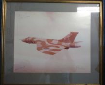 Vulcan signed photo. Large 65cm x 55cm colour photo of Vulcan XM575 in flight signed in the four