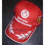 Michael Schumacher A full size adult cap clearly signed by Michael Schumacher in black marker on the