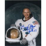 Buzz Aldrin A 10" x 8" photo clearly signed by Buzz Aldrin in blue marker to which he has added "