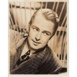 Alan Ladd A 20cm x 25cm photo clearly signed by Alan Ladd in blue ink, dedicated to Wilfred. Photo