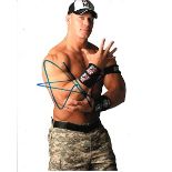 John Cena 8x10 photo of John, signed by the wrestler in NYC. Good condition