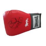 Veteran boxer Herol "Bomber" Graham signed full size red Lonsdale boxing glove. Known as one of