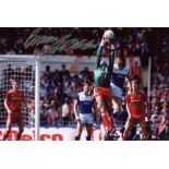 Liverpool 8x12 inch photo signed by Liverpool goalkeeper Bruce Grobbelaar, pictured in action during