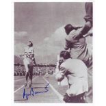 Roger Bannister 8x10 inch photo signed by athlete Sir Roger Bannister, the first man ever to run a