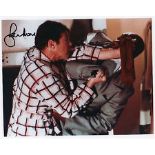 Moore Roger James Bond Roger Moore genuine authentic signed autograph photo, An 10" x 8" photo of