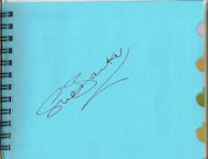 Tennis autograph book. Red autograph book with 7 tennis autographs. Names include Sue Barker, John
