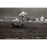 Liverpool-8x12 inch photo signed by former Liverpool goalkeeper Tommy Lawrence. Good Condition