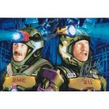 The Chuckle Brothers-8x10 inch photo signed by the Chuckle Brothers Barry and Paul Elliott. Good