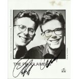 The Proclaimers signed 10 x 8 b/w photo. Hole punch marks to RH border which would trim nicely.