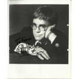 Elton John signed 10 x 8 b/w photo to Fiona. Hole punch marks to RH border which would trim
