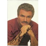 Burt Reynolds signed 6 x 4 colour photo to Fiona. Autograph Excellent, a few tape marks to