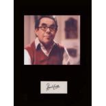 Sorry. Signature of Ronnie Corbett with picture of ‘Timothy Lumsden.’ Professionally mounted in