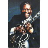 B B King signed 6 x 4 colour photo. Autograph excellent, few tape marks to reverse. Est. £10 - 15