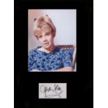 Hayley Mills. Signature with young portrait. Professionally mounted in black to 16”x12”.
