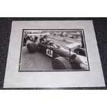 Brabham Jack A 22cm x 16cm image taken from a book, clearly signed in black by Sir Jack Brabham,