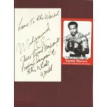 Muhammad Ali hand written not on white 6 x 4 card which reads Love to the World Muhammad Ali Three