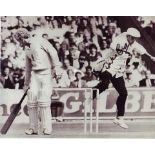 Dickie Bird: 8x10 inch photo signed by former cricket umpire Dickie Bird, pictured comically