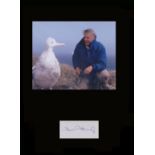 Sir David Attenborough. Signature with nature photo. Professionally mounted in black to 16”x12”.