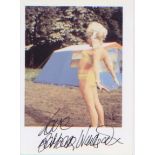 Carry on - Barbara Windsor. A signed p/c sized photo of Barbara Windsor in character from ‘Carry