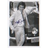 Dudley Moore. A 7 x 5 inch signed photo in character as ‘Arthur.’ Excellent.
