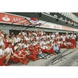 Massa/Todt/Raikkonen, A 20cm x 30cm colour photo of the Ferrari F1 team posing in the pit lane,