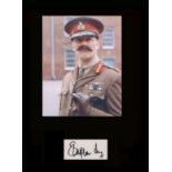 Black Adder. Stephen Fry. Signature with photo from ‘Black Adder Goes Forth.’ Professionally mounted