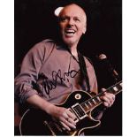 Frampton Peter, A 20cm x 25 cm, 10 x 8 inches photo, and clearly signed by Peter Frampton in black