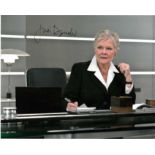 Dame Judi Dench 10x8 photo of Judi from Bond movies, signed by her in London. Good condition